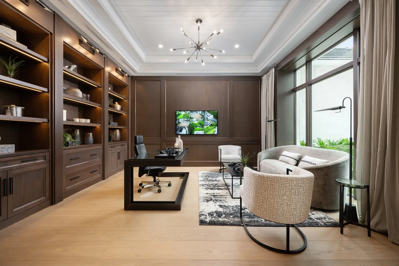 Light oak floor in a designer study with walnut built-ins